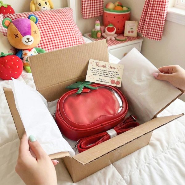 Small Red Cherry Ita Crossbody Bag with Clear Window for Plushies and Pins — crossbody ita bag detail view