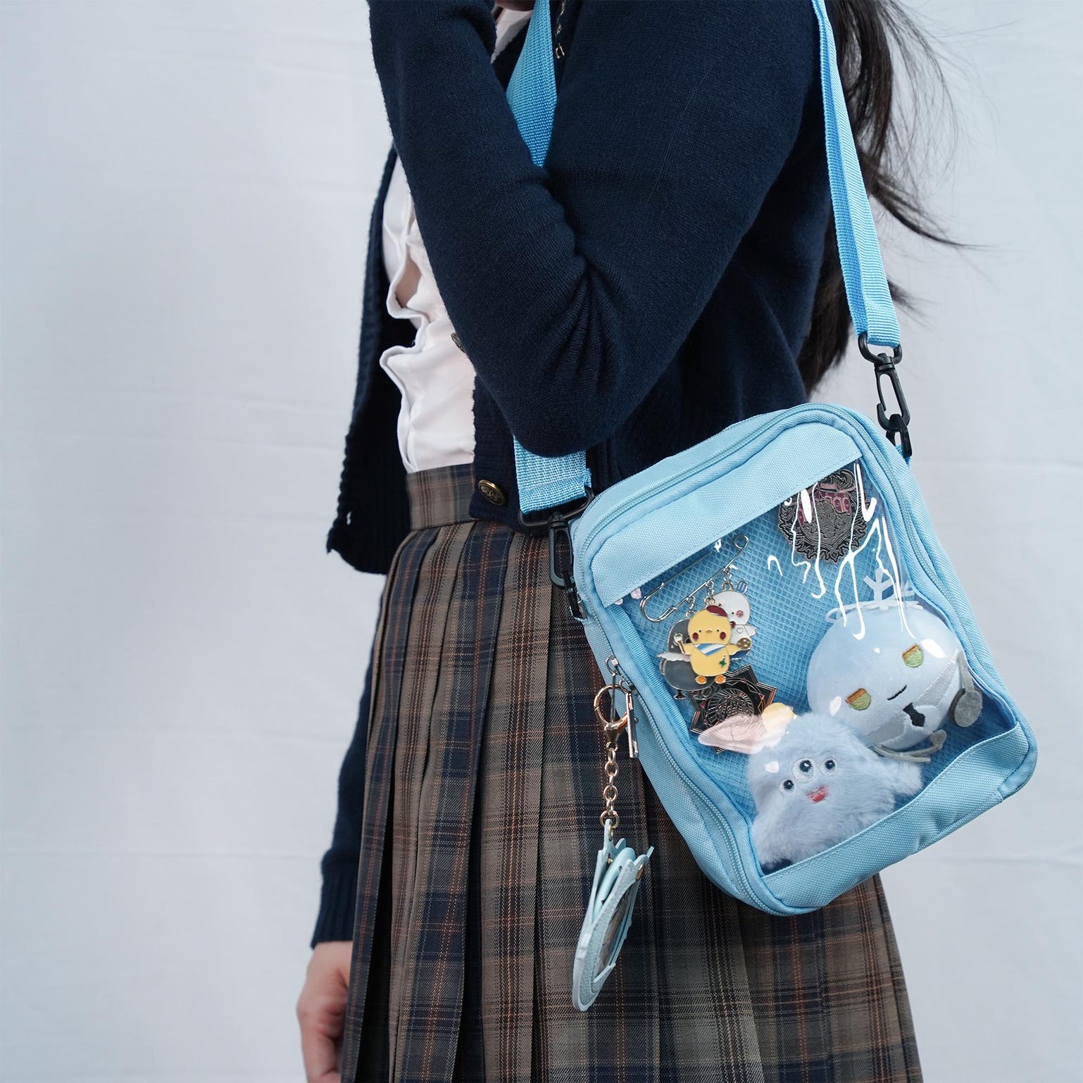 Small White Convertible Ita Bag with Clear Window for Pin Display Small White Convertible Ita Bag with Clear Window for Pin Display — mini ita bag detail view