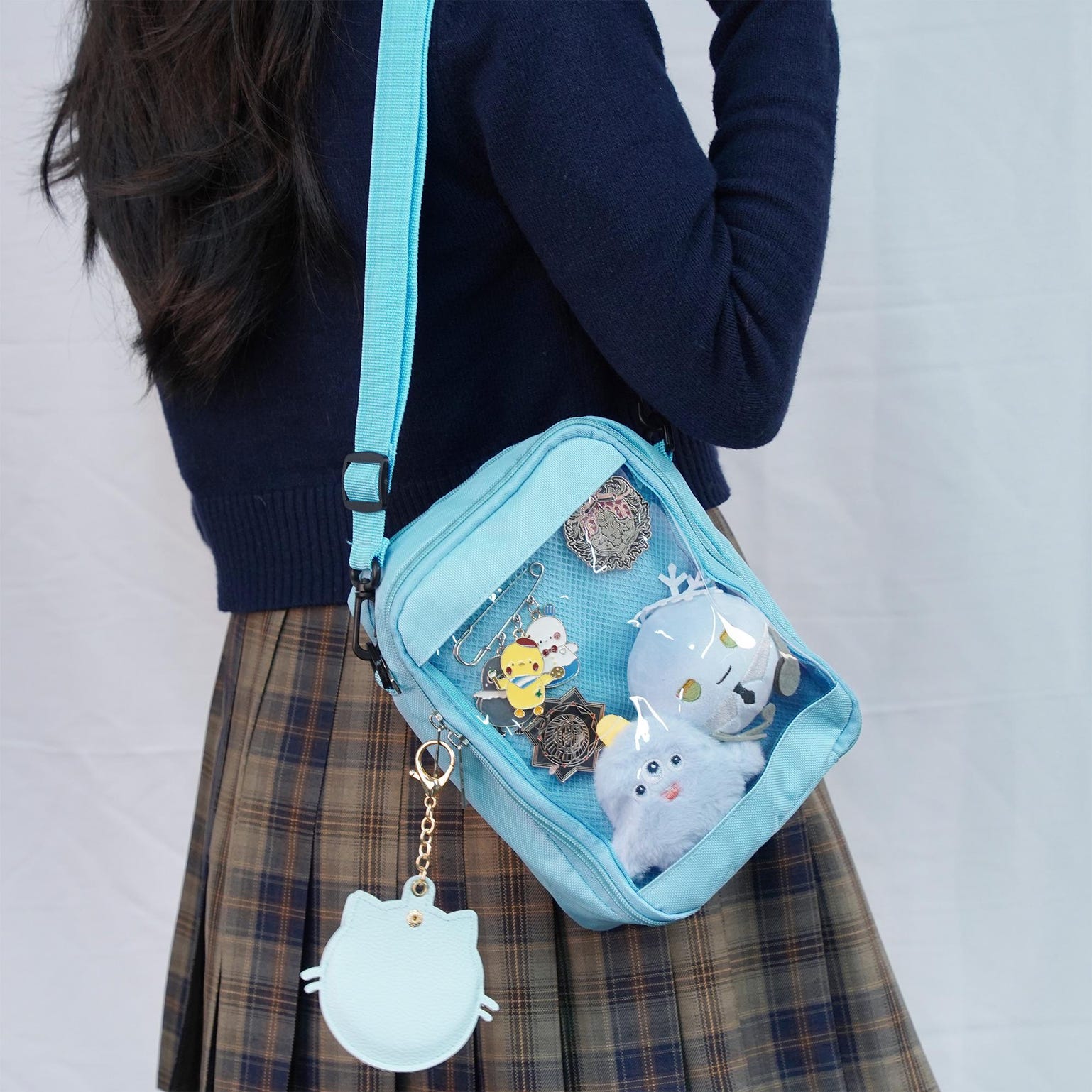Small White Convertible Ita Bag with Clear Window for Pin Display Small White Convertible Ita Bag with Clear Window for Pin Display — mini ita bag detail view