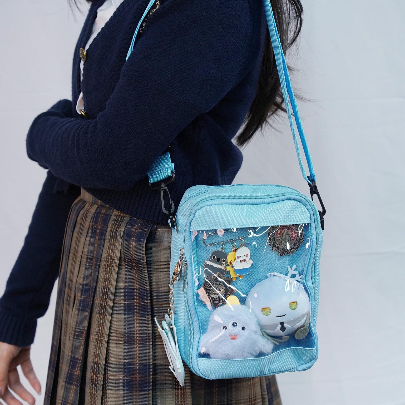 Small White Convertible Ita Bag with Clear Window for Pin Display Small White Convertible Ita Bag with Clear Window for Pin Display — mini ita bag detail view