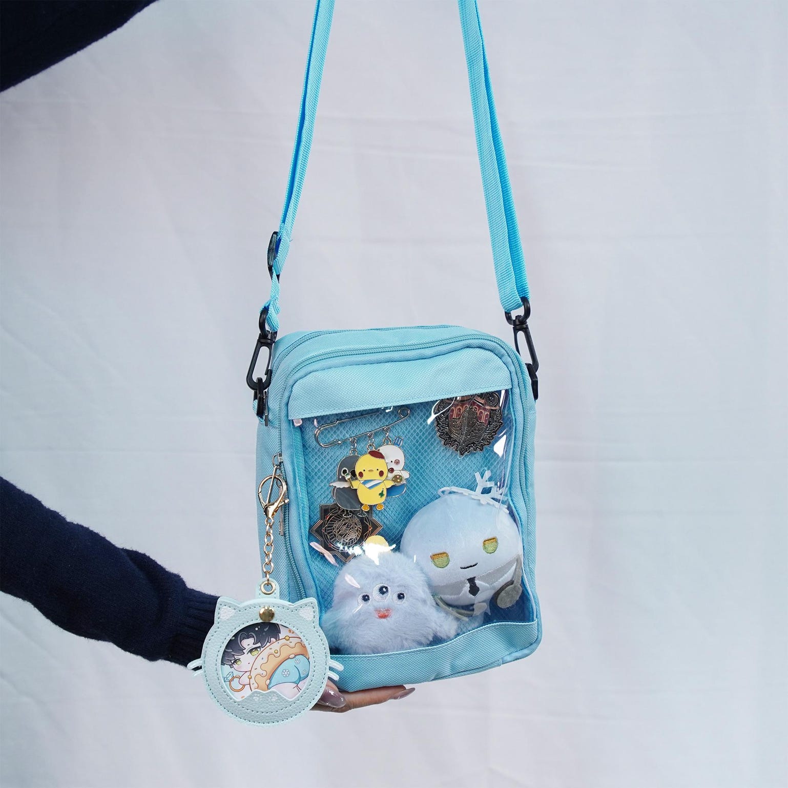 Small White Convertible Ita Bag with Clear Window for Pin Display Small White Convertible Ita Bag with Clear Window for Pin Display — mini ita bag detail view