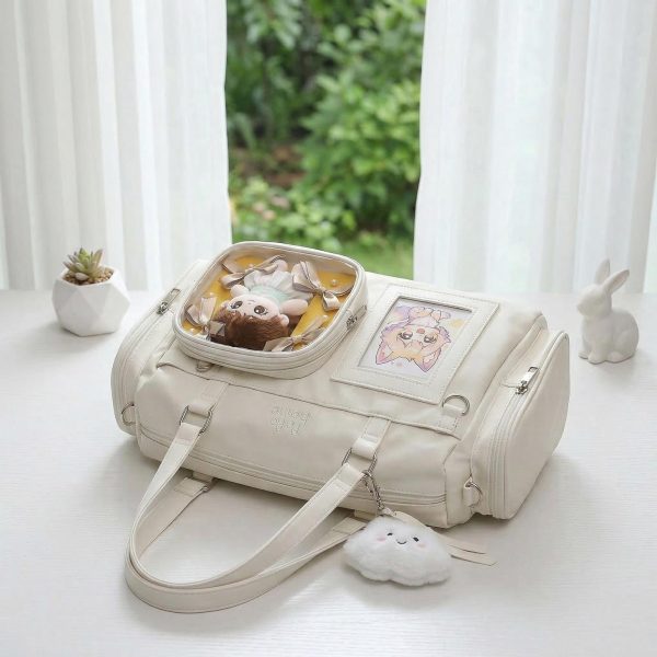White Ita Crossbody Bag with Clear Window for Plushies and Pins — crossbody ita bag detail view